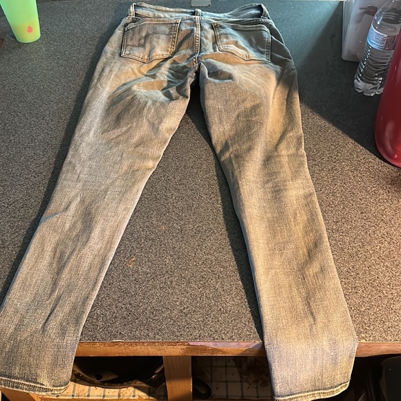 Skinny Jeans with Rips - Picture 2 of 2